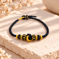 Quiet Joy | Black & Gold Handwoven Knot Bracelet